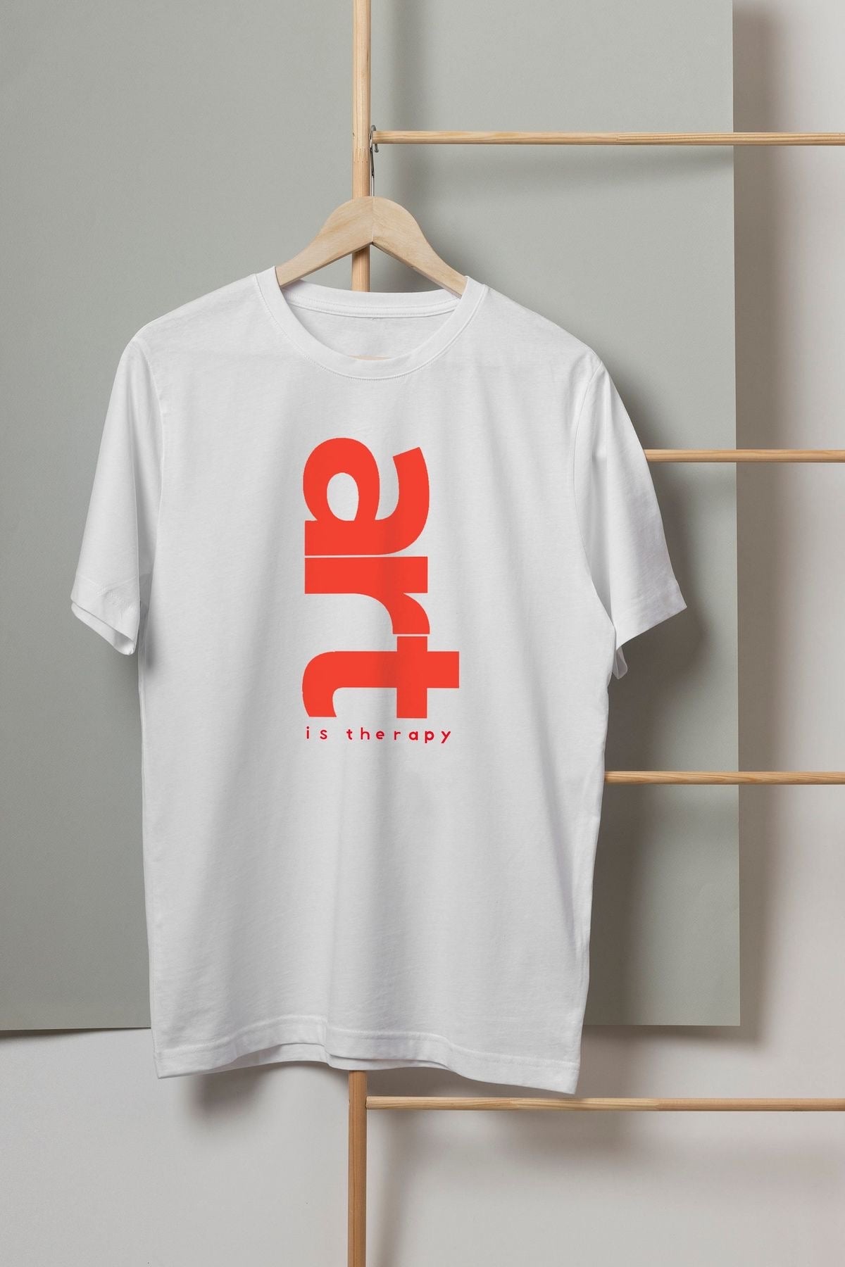 “Art is Therapy” White Graphic T-Shirt for Women | Bold Vertical Red Print