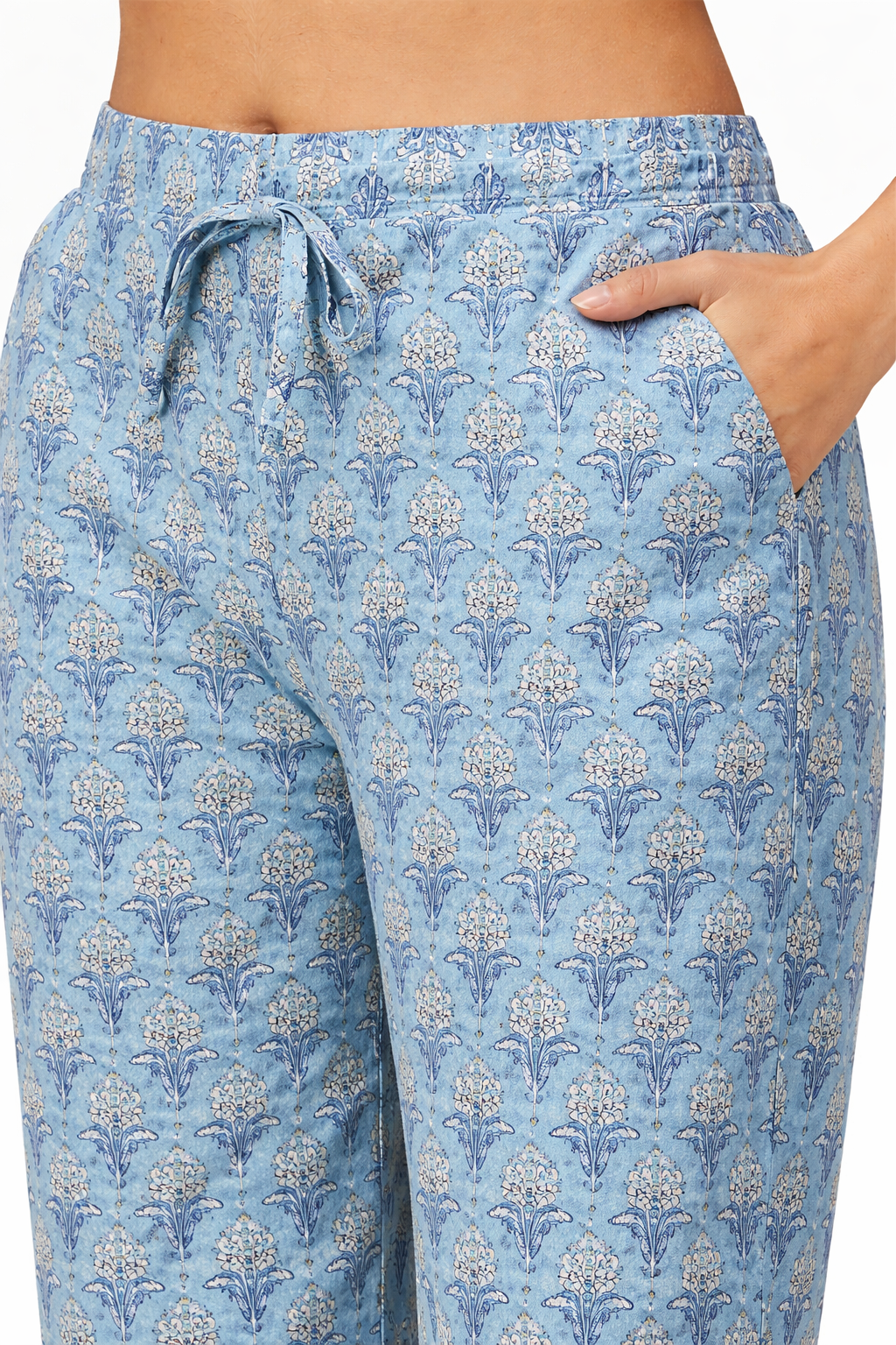 Blue patterned pajama pants worn by a person