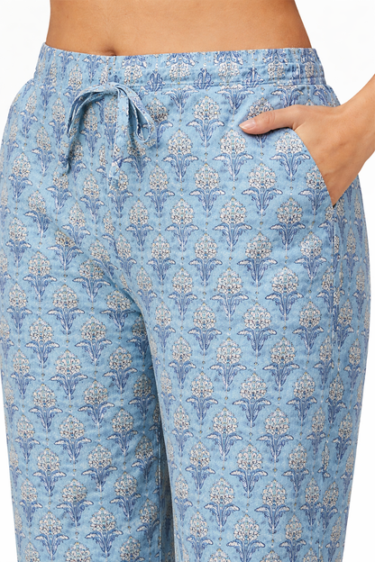 Blue patterned pajama pants worn by a person