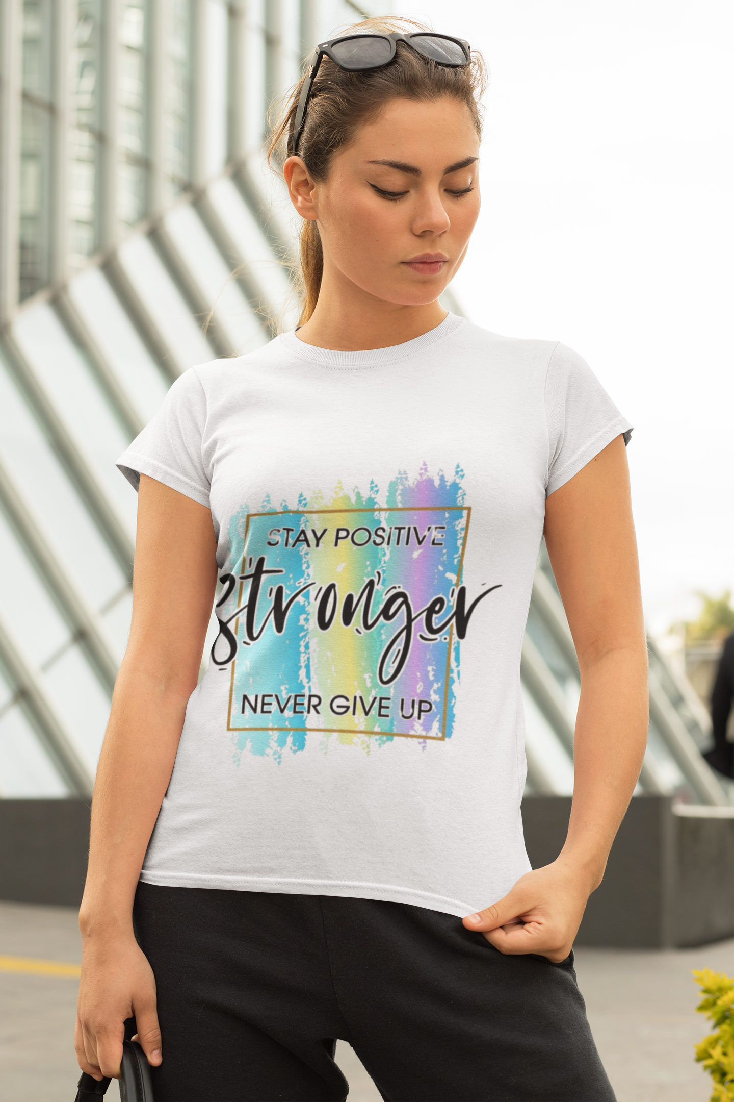 White Graphic T-Shirt – “Stay Positive, Stronger, Never Give Up” Rainbow Brush Print
